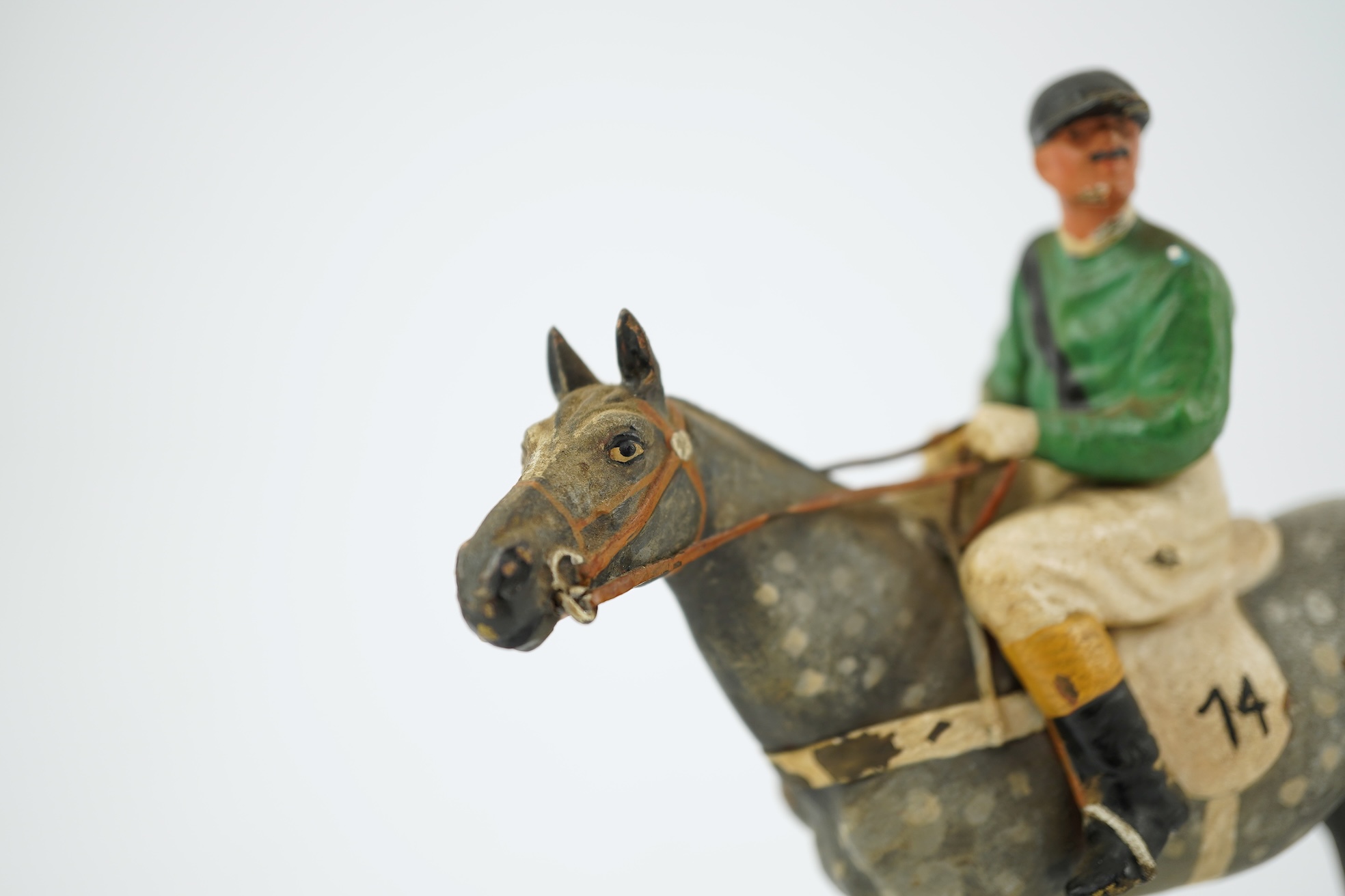 Two Austrian cold-painted bronze figures groups of jockeys on racehorses, early 20th century